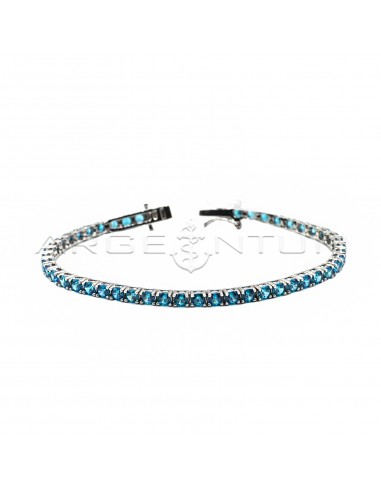 Tennis bracelet with 3mm blue zircons...