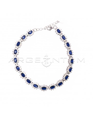 Bracelet with blue oval zircons in a...