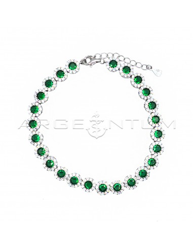 Bracelet with round green zircons in...