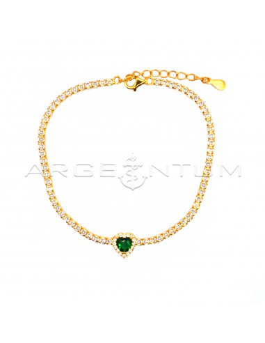 Tennis bracelet with central green...