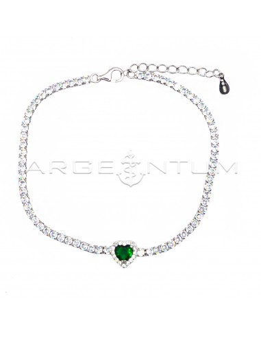 Tennis bracelet with central green...