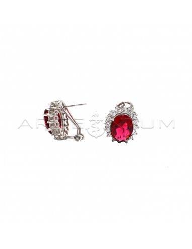 Lobe earrings with red oval stone in...