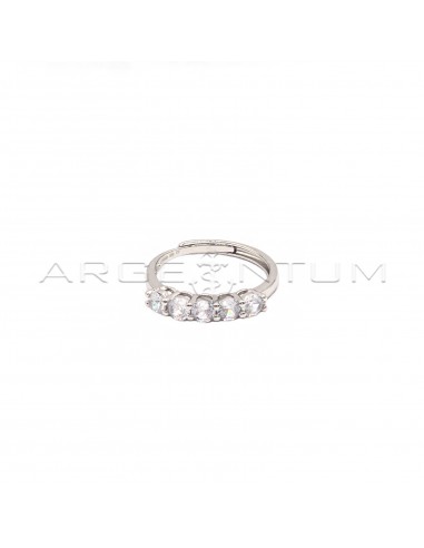 Adjustable ring with 5 white zircons...