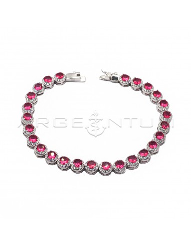Bracelet with round red zircons in a...