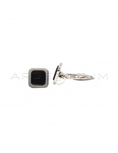 Square cufflinks with central onyx...