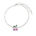 Diamond rolled mesh bracelet with central red semi-zircon cherry and green enamelled leaves white gold plated in 925 silver