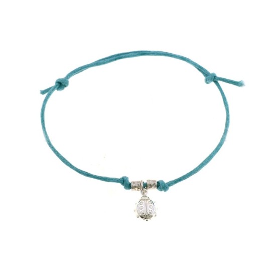 Bracciale in cordino azzurro con nodi scorsoi, pepite martellate placcate oro bianco e coccinella pendente accoppiata in argento