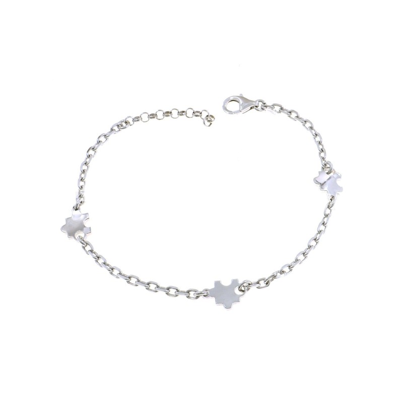 Forced mesh bracelet with white gold plated puzzle pieces in 925 silver