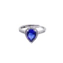 Anello regolabile con goccia di zircone blu in cornice di zirconi bianchi placcato oro bianco in argento 925