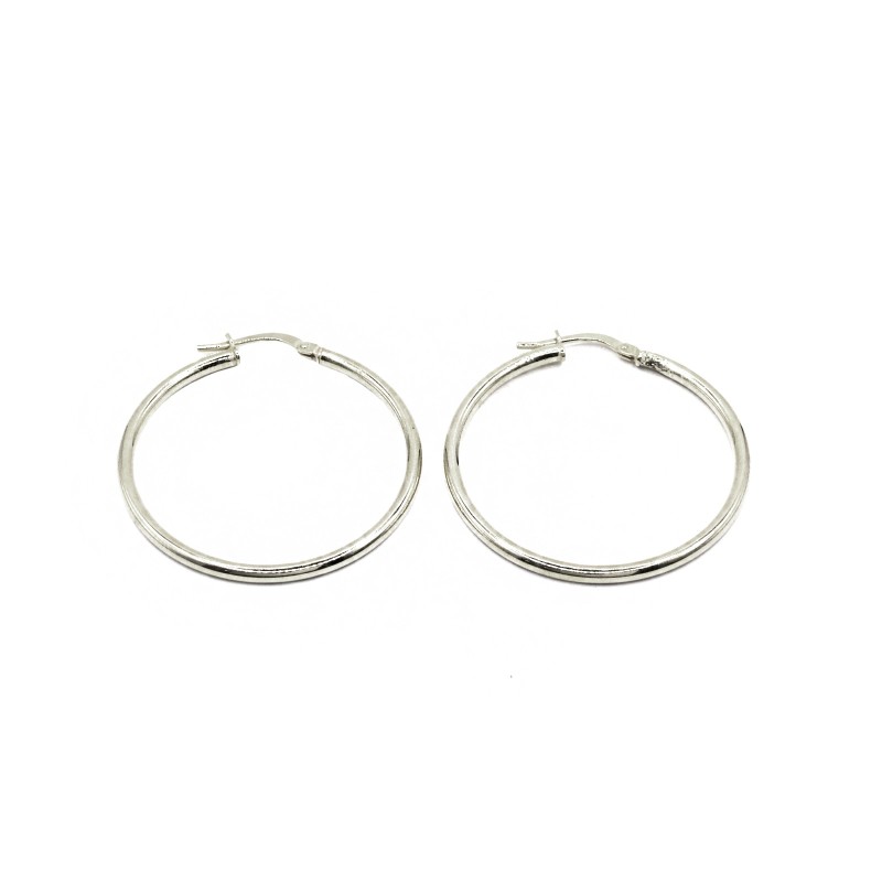 Orecchini a cerchio canna tubolare con chiusura a ponte placcati oro bianco in argento 925