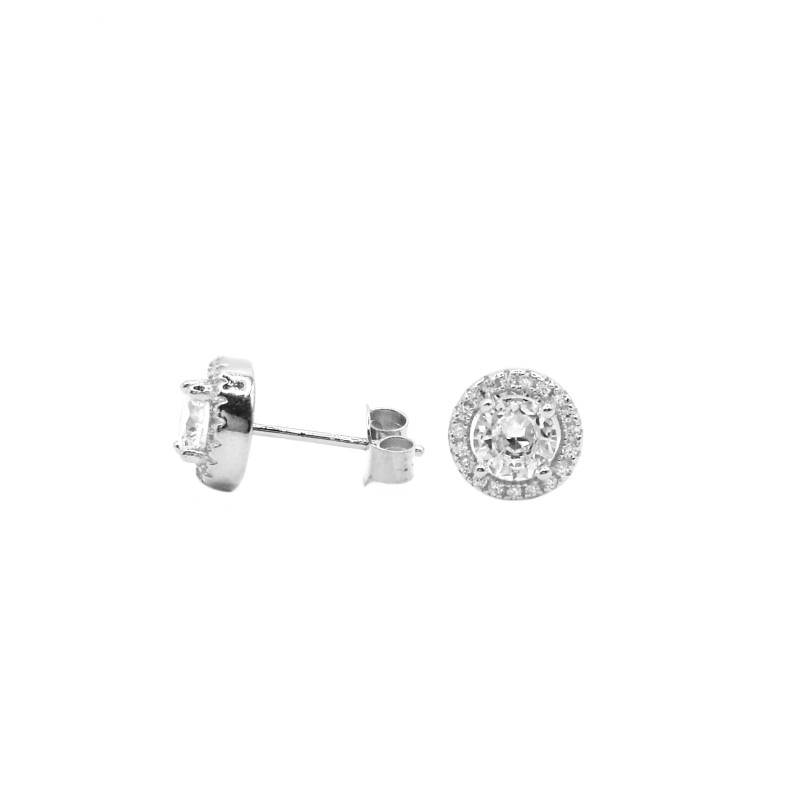 Orecchini al lobo tondi con punto luce in cornice di zirconi bianchi placcato oro bianco in argento 925