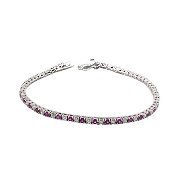 White gold plated tennis bracelet with 3 mm white and black zircons. in 925 silver