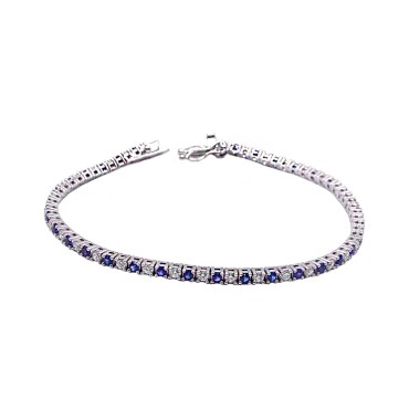 White gold plated tennis bracelet with 3 mm white and black zircons. in 925 silver