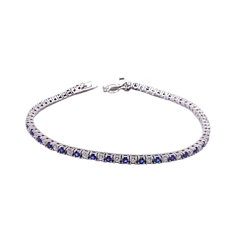 White gold plated tennis bracelet with 3 mm white and black zircons. in 925 silver